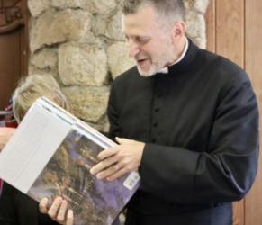St. Columba’s, Inverness presents its vicar with a copy of the Saint John’s Bible 
